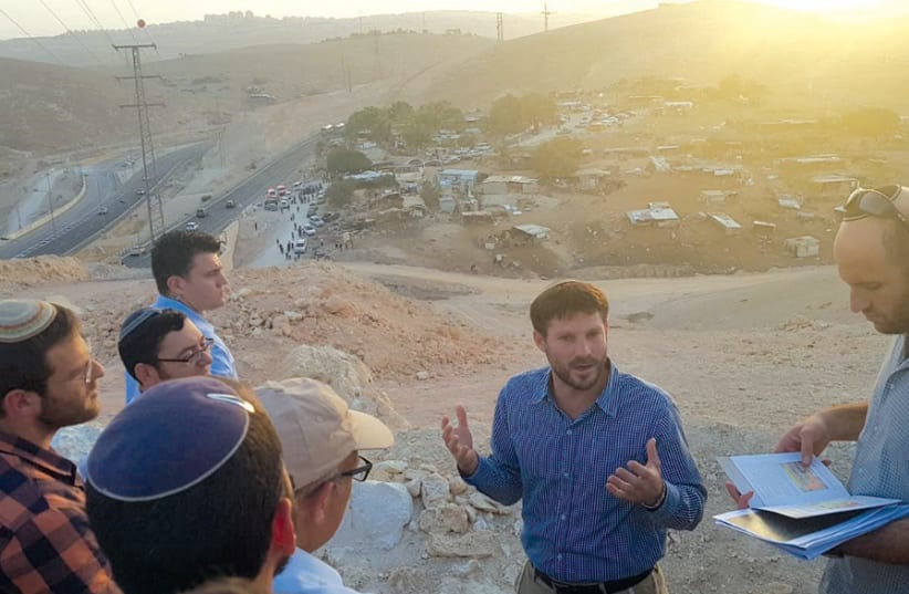 AT ILLEGAL West Bank Bedouin village Khan Al-Ahmar, advocating for its demolition in October. (photo credit: Courtesy)