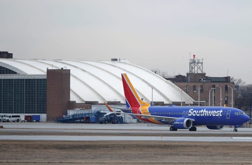 Southwest Airlines Co. Boeing 737 MAX 8 aircraft at Midway International Airport in Chicago (photo credit: KAMIL KRACZYNSKI/ REUTERS)