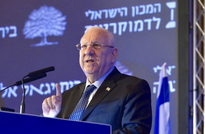 Israeli President Reuven Rivlin speaks at a conference initiated by the Israel Democracy Institute (photo credit: AVSHALOM SASSONI/MAARIV)