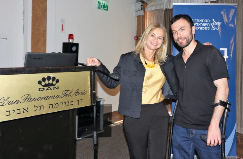 DAN HOTELS head of marketing Tali Kedar with gold medalist Noam Gershony (photo credit: KEREN ISAACSON)
