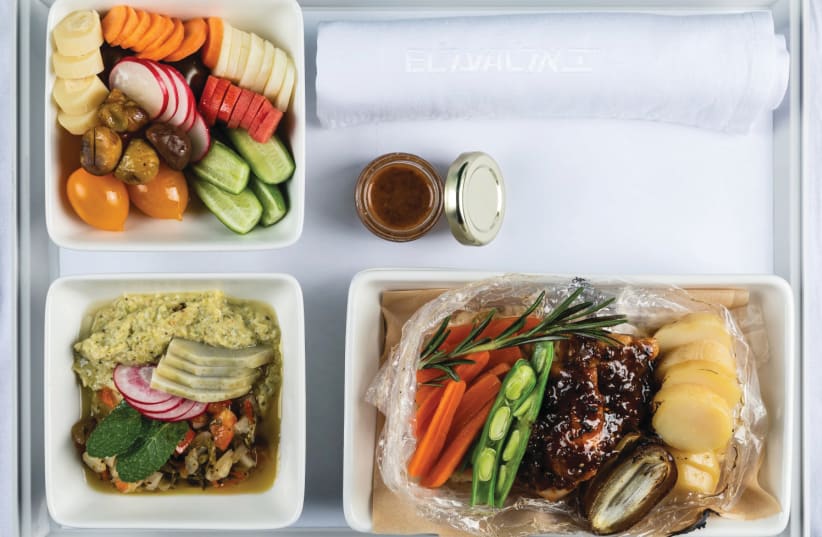 EL AL meals have changed. This one includes spring chicken with bulgur in a red-wine sauce, and grilled artichoke with chimichurri (photo credit: PINI SILUK)