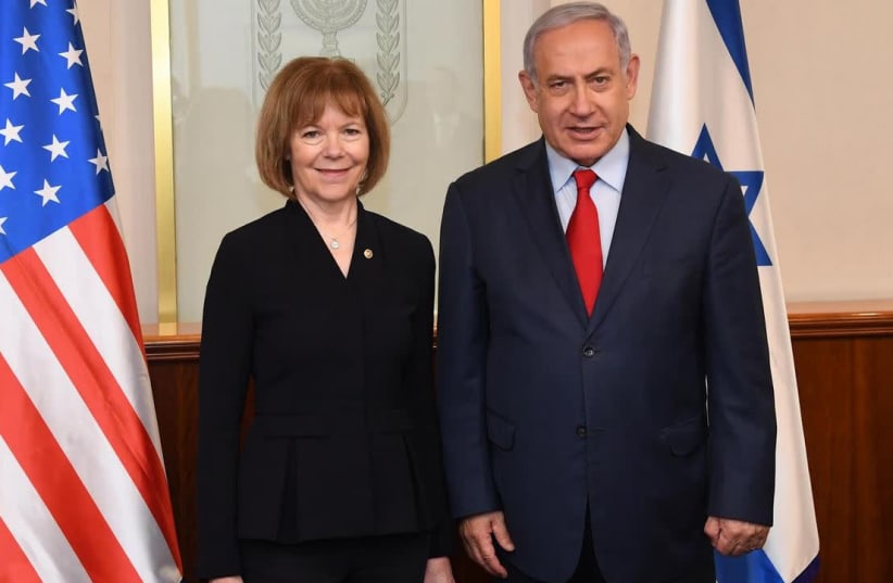 US Senator Tina Smith [D-MN] and Prime Minister Benjamin Netanyahu  (photo credit: HAIM ZACH/GPO)