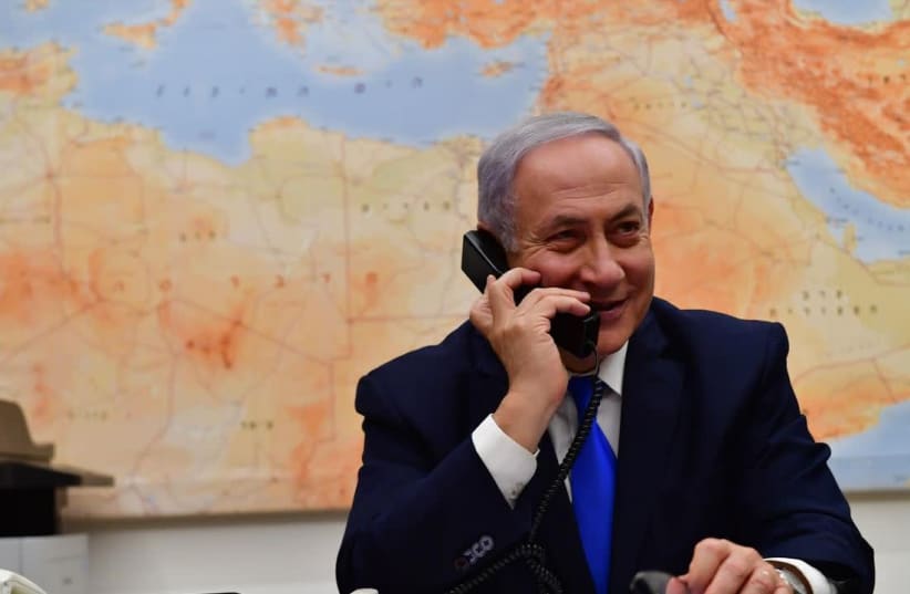 Prime Minister Benjamin Netanyahu speaking over the phone with U.S. President Donald Trump, after the latter called for US recognition of Israeli soverignty over the Golan Heights, March 21, 2019 (photo credit: KOBI GIDEON/GPO)