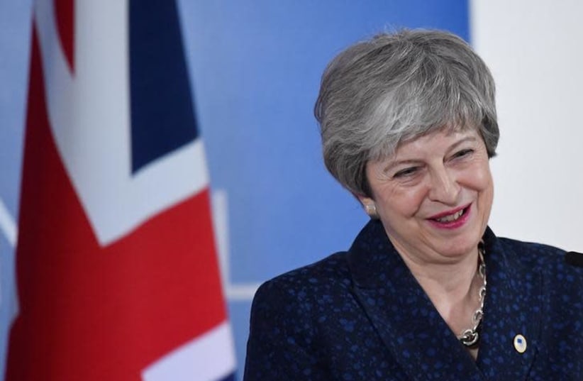 Britain's Prime Minister Theresa May gives a news briefing after meeting with EU leaders in Brussels, Belgium May 22, 2019 (photo credit: REUTERS/TOBY MELVILLE)