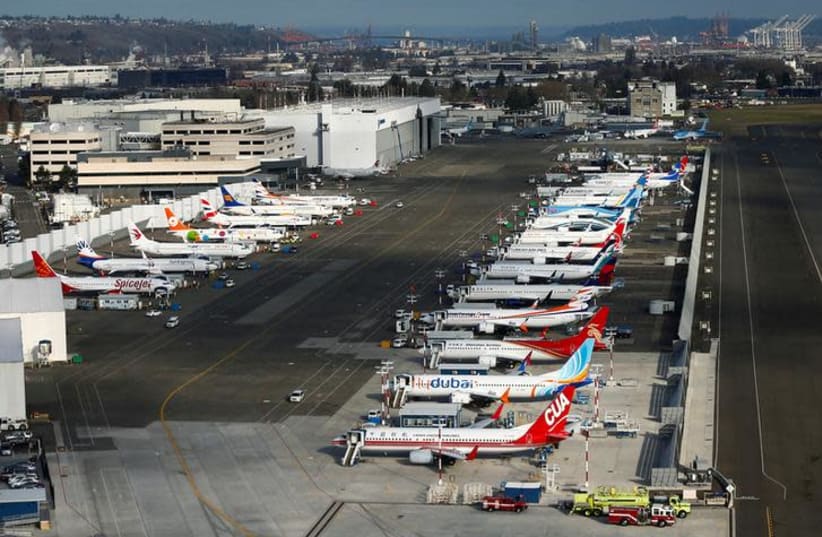 An aerial photo shows several Boeing 737 MAX airplanes grounded at Boeing Field in Seattle, Washington, U.S. March 21, 2019 (photo credit: REUTERS/LINDSEY WASSON)
