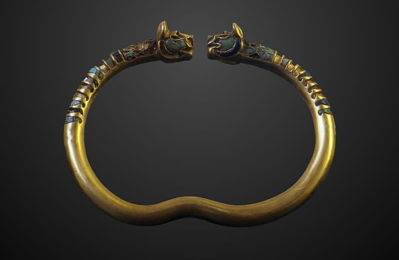 Bracelet ornated with a pair of lion heads found in Susa  (photo credit: Wikimedia Commons)