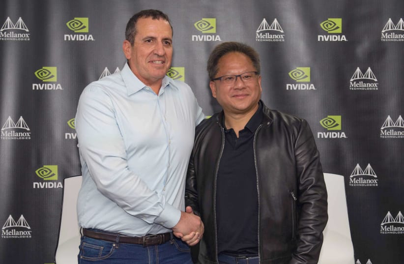 Mellanox Technologies CEO Eyal Waldman (L) and Nvidia CEO Jason Huang (photo credit: OMER TAL)