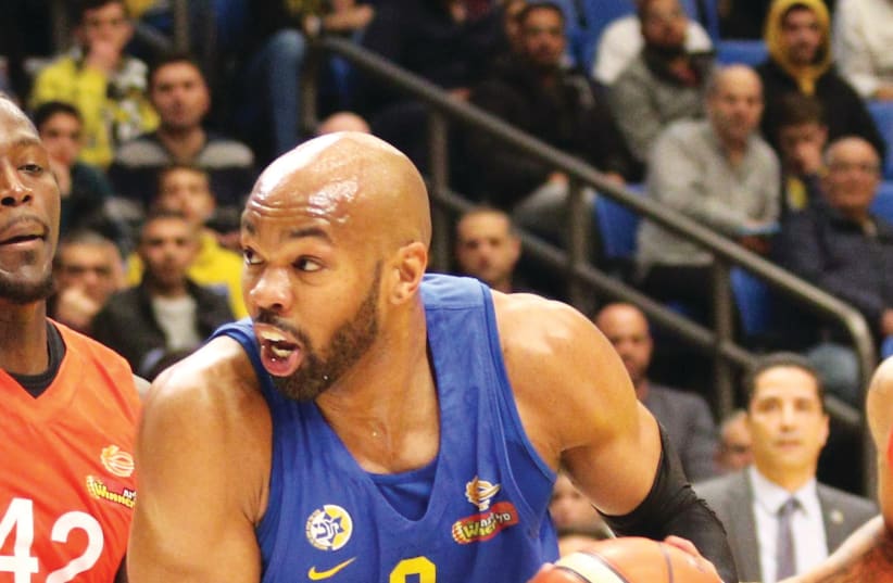 ALEX TYUS led Maccabi Tel Aviv with 21 points in the yellow-and-blue’s 86-74 home victory over Ness Ziona in BSL action on Monday night (photo credit: ADI AVISHAI)
