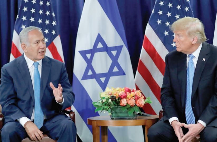 Prime Minister Benjamin Netanyahu meets US President Donald Trump; Psychology Prof. Shaul Kimhi of Tel Hai College notes Netanyahu’s ‘ability to mobilize his supporters,’ a trait he says that also characterizes Trump (photo credit: CARLOS BARRIA / REUTERS)