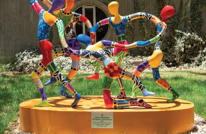 ‘The Dancers’ by Dorit Levinstein in the Ita and Eitan Dayan Garden, donated by Riki and Coby Dayan in tribute to Prof. Rivka Carmi. (photo credit: DANI MACHLIS)