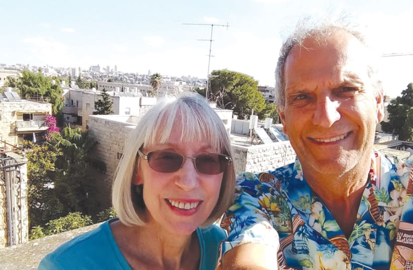SMILING ON the roof of their rental flat, Jerusalem. (photo credit: Courtesy)