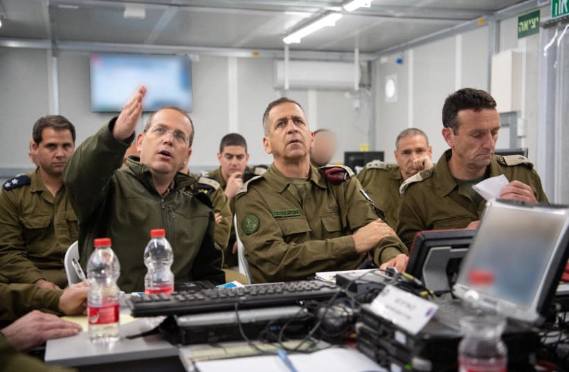IDF Chief of Staff Aviv Kochavi surrounded by high-ranking officers as they prepare for escalations along the Gaza border, 2019. (photo credit: IDF SPOKESPERSON'S UNIT)
