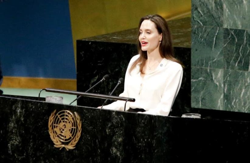 Actor and UNHCR Special Envoy Angelina Jolie addresses a U.N. ministerial meeting on peacekeeping at U.N. headquarters in New York, U.S., March 29, 2019 (photo credit: REUTERS/EDUARDO MUNOZ)