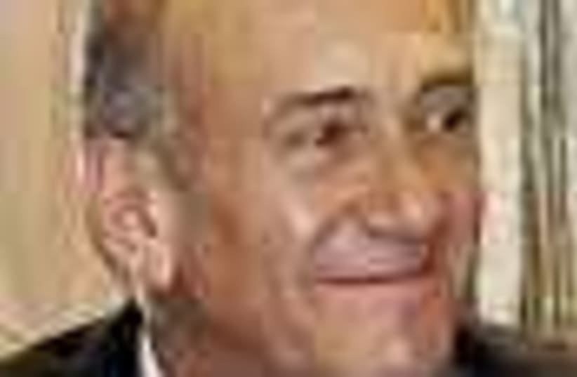Olmert smiles 88 (photo credit: )