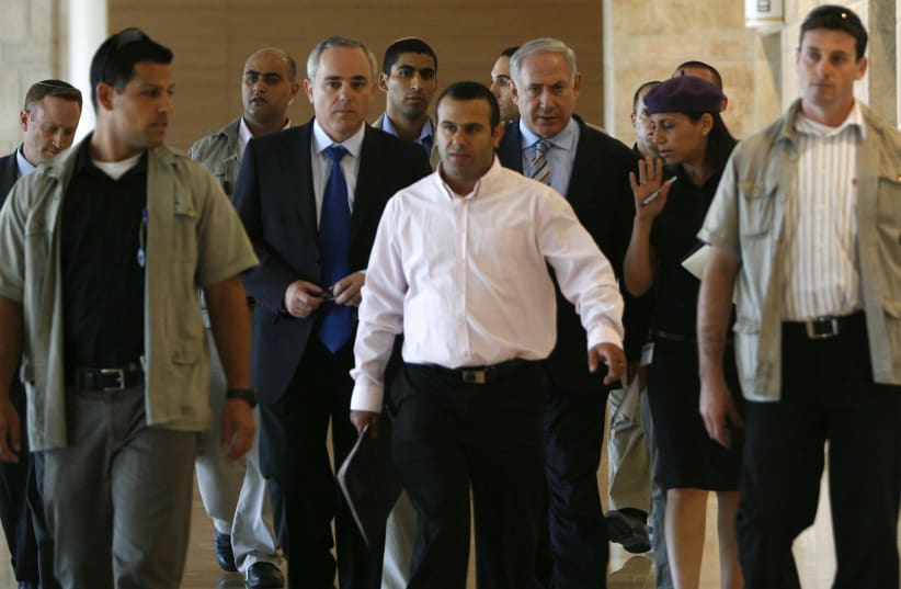 (FROM LEFT) Leading the charge: Shalom Shlomo walks ahead of Prime Minister Benjamin Netanyahu and Energy Minister Yuval Steinitz (left) (Flash 90) (photo credit: FLASH90)