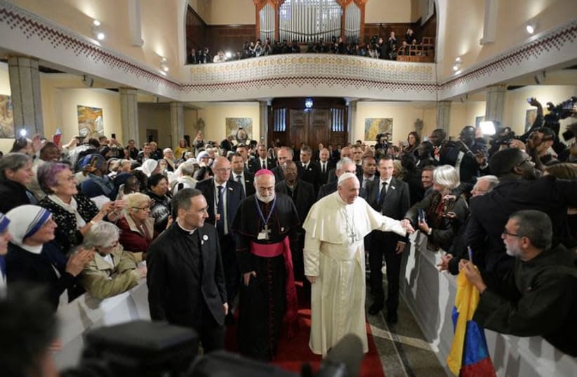 Pope Francis is seen during a meeting with representatives of other Christian denominations at Saint Peter's Cathedral in Rabat, Morocco, March 31, 2019 (photo credit: REUTERS)