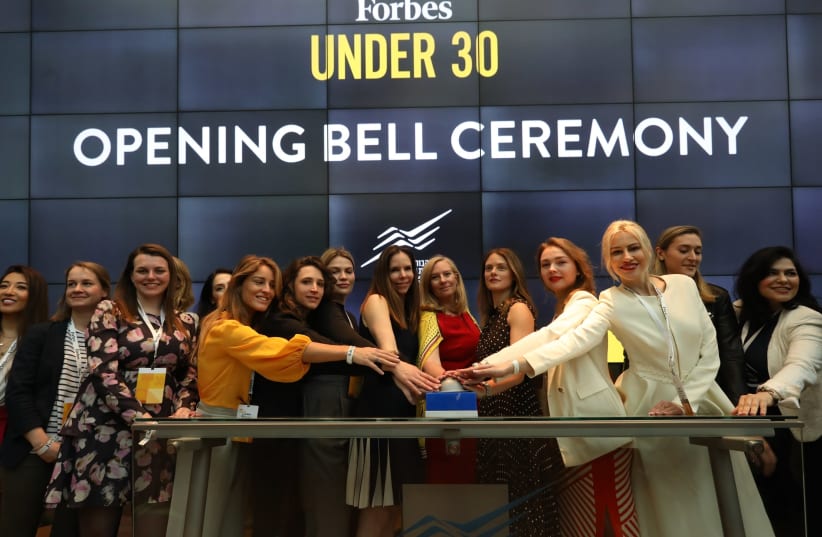 Forbes Under 30 Global Women's Summit participants open the trading at Tel Aviv Stock Exchange, March 31, 2019  (photo credit: OMER MESSINGER)