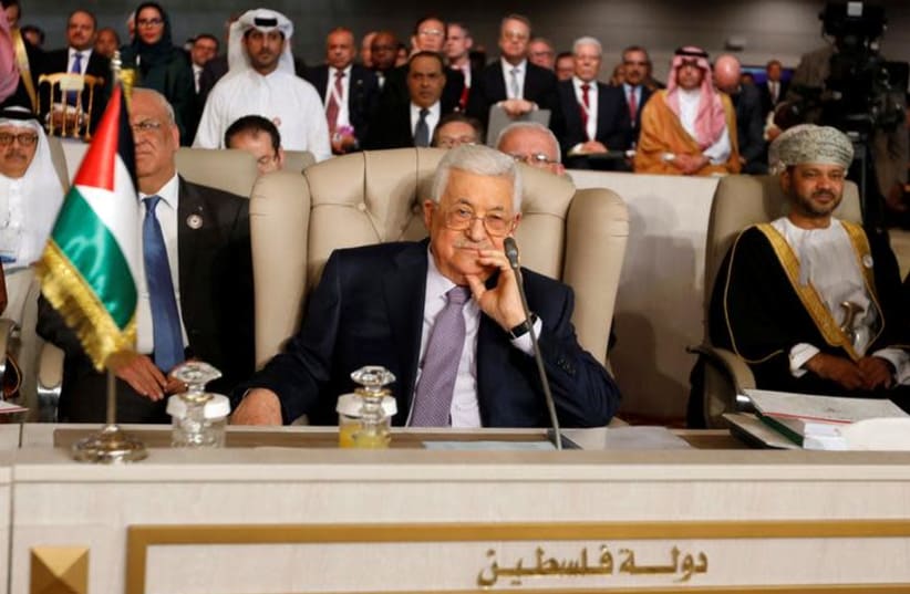 Palestinian President Mahmoud Abbas attends the 30th Arab Summit in Tunis, Tunisia March 31, 2019 (photo credit: REUTERS/ZOUBEIR SOUISSI)