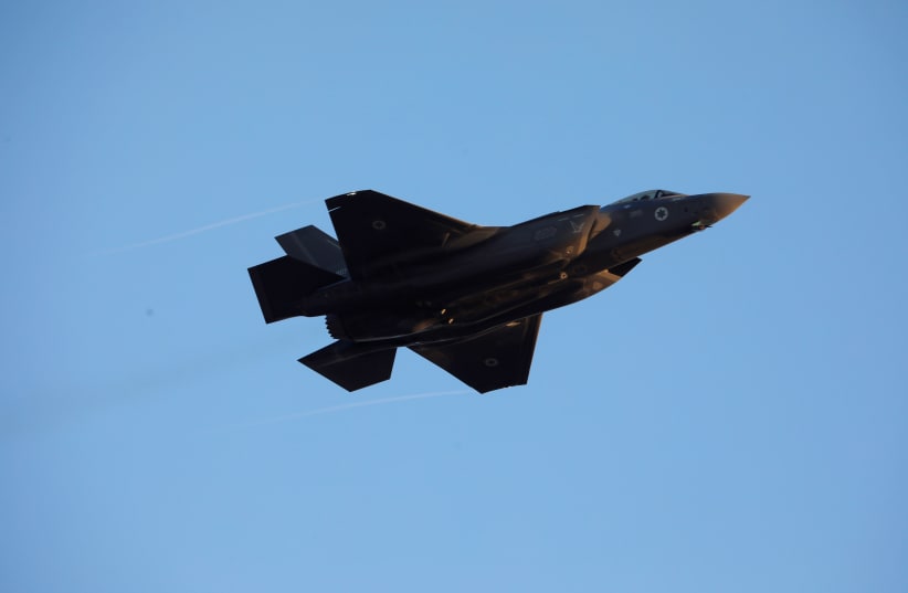 Israeli Air Force F-35 flies during an aerial demonstration at a graduation ceremony for Israeli air force pilots at the Hatzerim air base in southern Israel December 26, 2018.  (photo credit: AMIR COHEN/REUTERS)