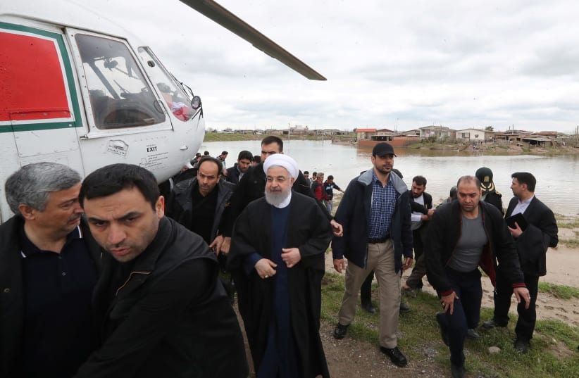 Iranian President Hassan Rouhani is seen during his visit after flooding in Golestan province, Iran March 27, 2019 (photo credit: IRANIAN PRESIDENCY WEBSITE/HANDOUT VIA REUTERS)