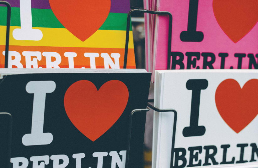 "I love Berlin" postcards in Berlin, Germany (illustrative) (photo credit: MARKUS SPISKE / UNSPLASH)