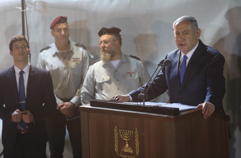Prime Minister Benjamin Netanyahu eulogizes at the funeral of Zachary Baumel, 2019. (photo credit: MARC ISRAEL SELLEM)