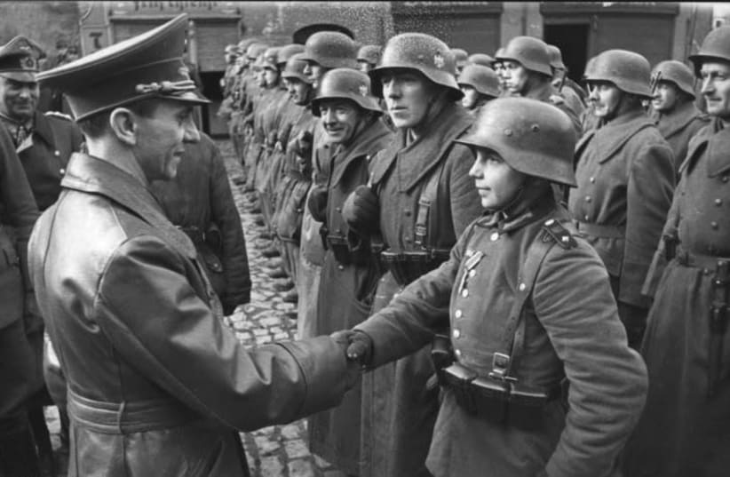9 March 1945: Goebbels awards a 16-year-old Hitler Youth, Willi Hübner, the Iron Cross for the defence of Lauban (photo credit: Wikimedia Commons)