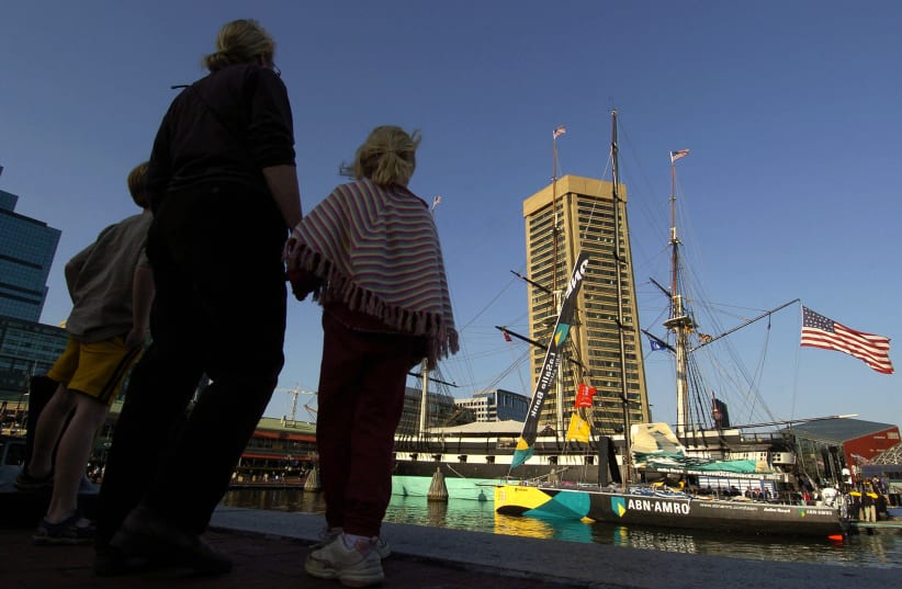 Visitors view ABN AMRO ONE at inner harbor in Baltimore after winning fifth leg of Volvo Ocean Race (photo credit: REUTERS)