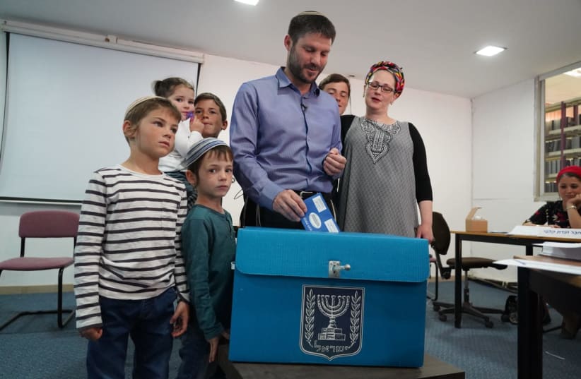 Betzalel Smutrich voting in Kedumim (photo credit: HILLEL MEIR/TPS)