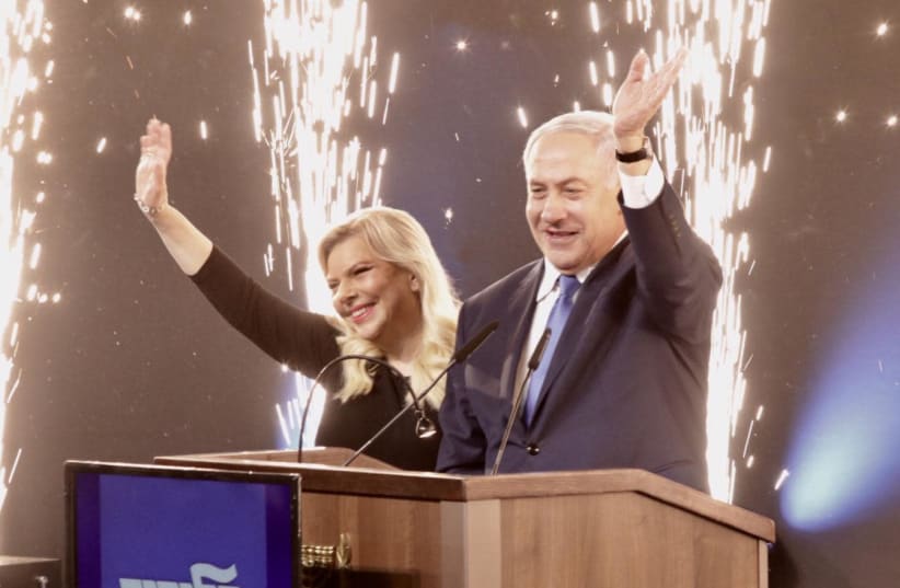Prime Minister Benjamin Netanyahu and his wife declare victory (photo credit: ALONI MOR)