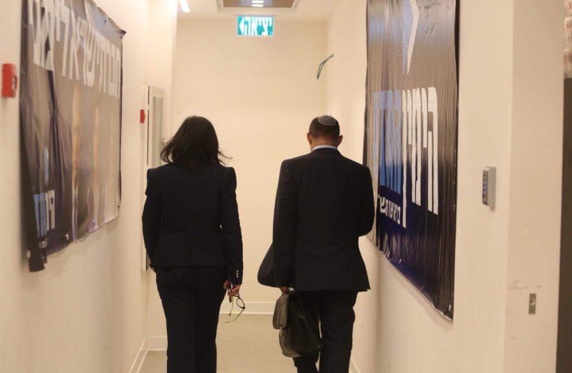 The New Right's Naftali Bennett and Ayelet Shaked walk off after exit polls show they won't enter the 21st Knesset (photo credit: MARC ISRAEL SELLEM)