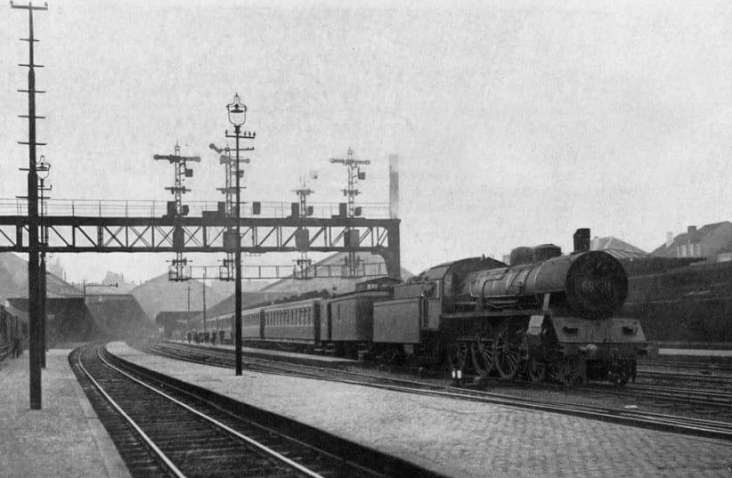 A train to Antwerp leaving the Brussels-North station in the 1920s (photo credit: Wikimedia Commons)