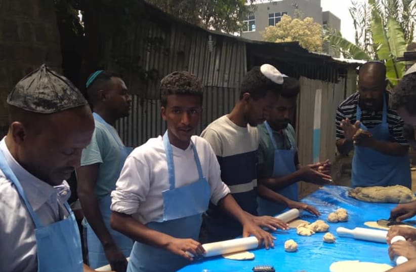 Ethiopian youth prepare the Seder in Gondar, Ethiopia (photo credit: JEWISH AGENCY)