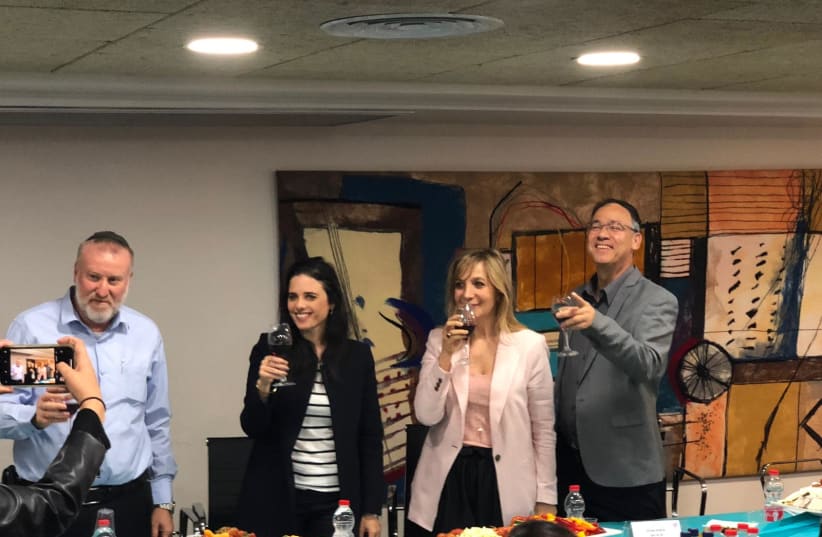 Ayelet Shaked raises a toast to Justice Ministry workers before Passover on April 17th, 2019 (photo credit: Courtesy)