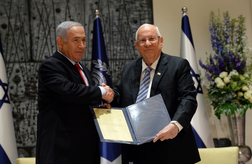 President Rivlin entrusting Prime Minister Netanyahu with forming the government (photo credit: HAIM ZACH/GPO)