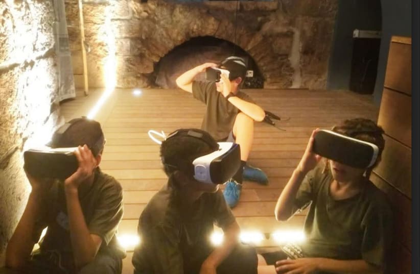 Children using virtual reality technology to learn about Jewish culture  (photo credit: Courtesy)