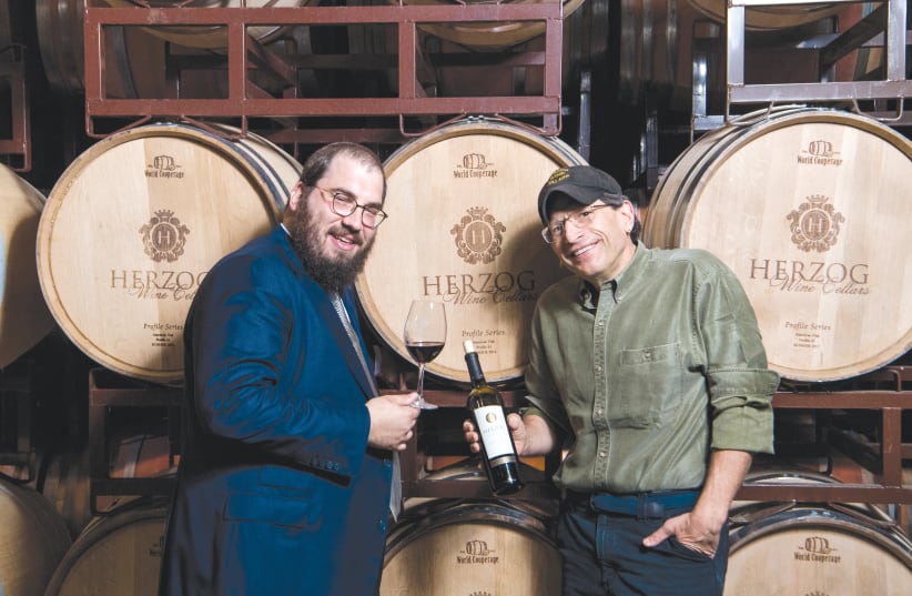 Winery CEO Joseph Herzog (left) raises a glass with winemaker Joe Hurliman (photo credit: Courtesy)