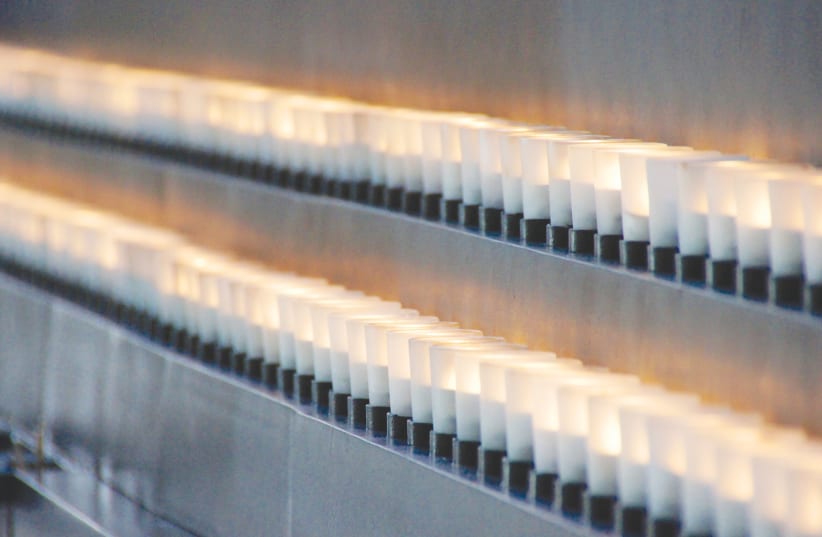 Holocaust memorial candles (photo credit: TED EYTAN/FLICKR)