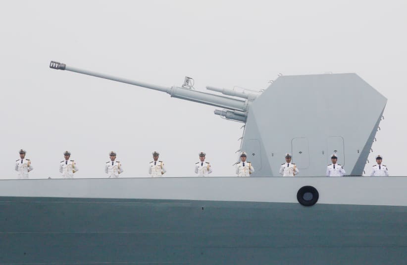 THE CHINESE navy’s destroyer ‘Taiyuan’ takes part in a naval parade off the eastern port city of Qingdao this week (photo credit: REUTERS)