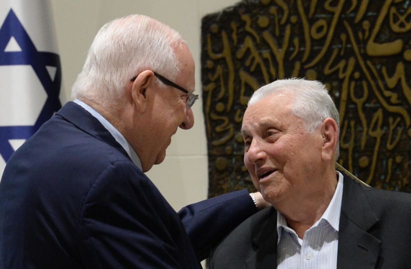 President Reuven Rivlin and Holocaust survivor Yosef Hershkovich (photo credit: MARK NEYMAN/GPO)