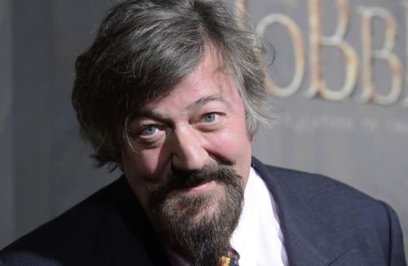 Cast member Stephen Fry attends the premiere of the film "The Hobbit: The Desolation of Smaug" in Los Angeles December 2, 2013. (photo credit: PHIL MCCARTEN/REUTERS)