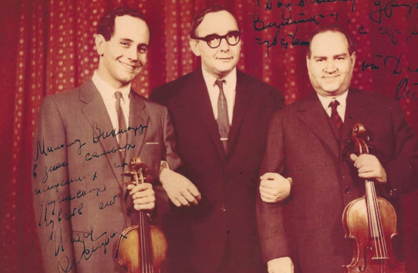 Hochhauser with Igor and David Oistrakh before their first performance of the Bach Double Concerto in 1963 (photo credit: Courtesy)