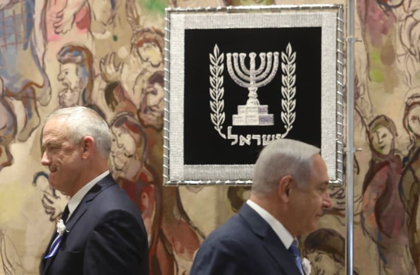 Benny Gantz and Benjamin Netanyahu at swearing in of 21st Knesset (photo credit: MARC ISRAEL SELLEM)