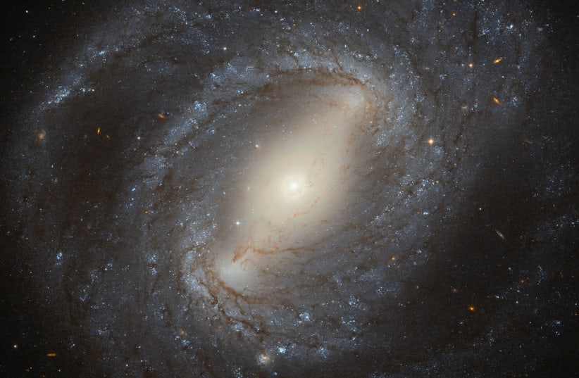 NGC 4394, a barred spiral galaxy situated about 55 million light-years from Earth (photo credit: NASA)