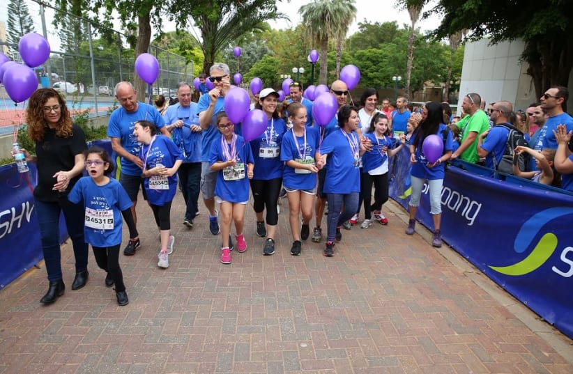 Silent Angels race to help those with Rett Syndrome (photo credit: MARK NOMDAR)