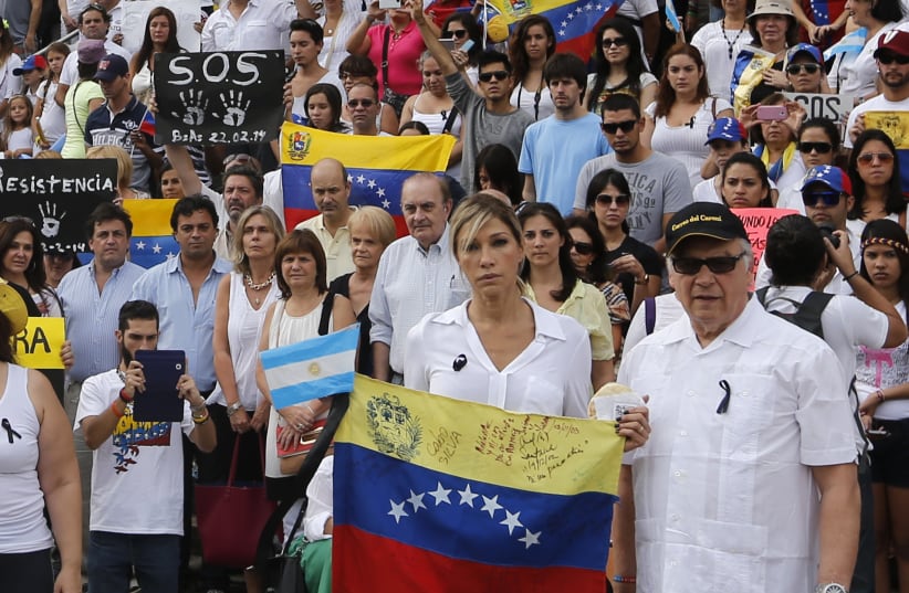 Venezuelan actress Catherine Fulop takes part of a rally against Venezuela President Nicolas Maduro, 2014. (photo credit: ENRIQUE MARCARIAN / REUTERS)