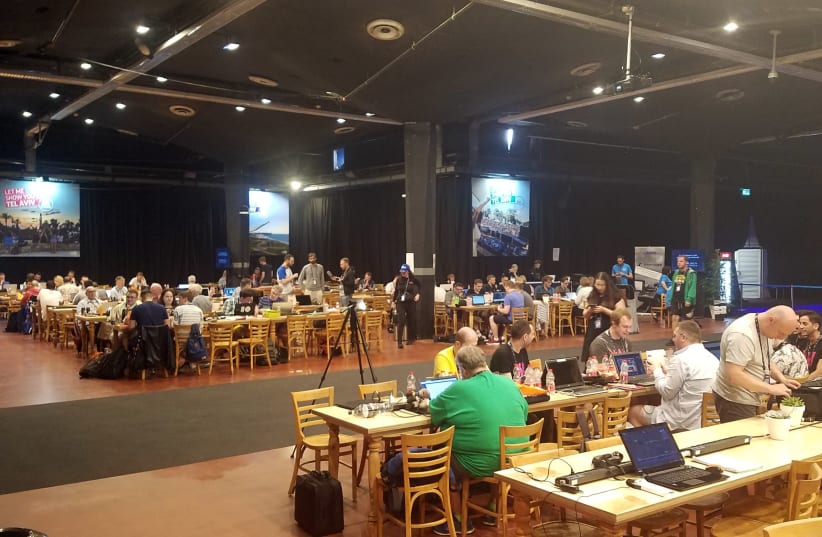 International media seated in the Eurovision press room at the Expo Tel Aviv on Monday. (photo credit: AMY SPIRO)