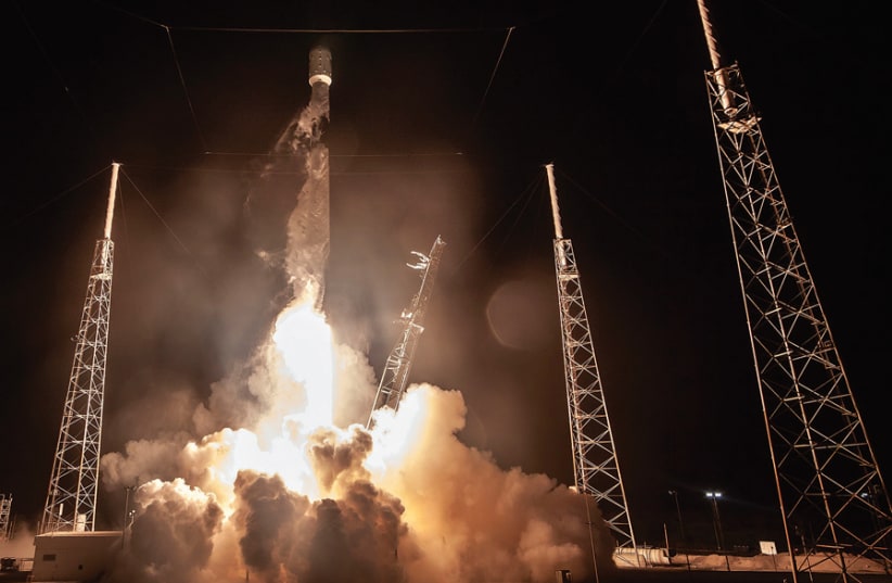 A SPACEX Falcon 9 rocket carrying Israel’s first spacecraft designed to land on the moon lifts off on the first privately-funded lunar mission at the Cape Canaveral Air Force Station in Cape Canaveral, Florida. (photo credit: JOE SKIPPER/REUTERS)