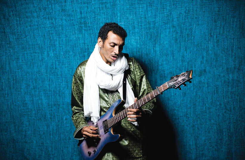 NIGERIAN MUSICIAN BOMBINO: ‘Harmonically and also rhythmically, there are a lot of deep connections between Arabic music and Tuareg music.’  (photo credit: MADS MAUSTAD)