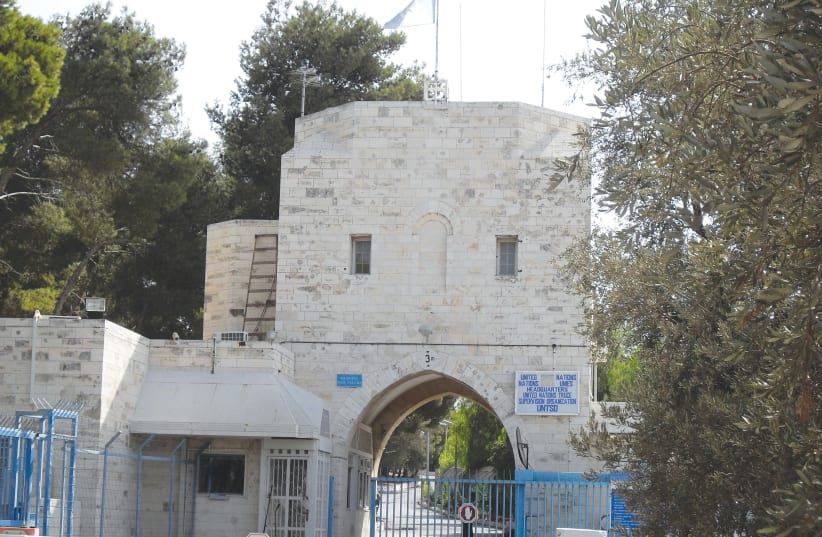 THE GOVERNMENT HOUSE, atop the ridge of Jebl Mukaber, in southeastern Jerusalem. The location has long been identified as the location of the Palace of the High Priest Caiaphas, where the decision to crucify Jesus was made; a site known in Christian tradition as the Hill of Evil Counsel (photo credit: Wikimedia Commons)